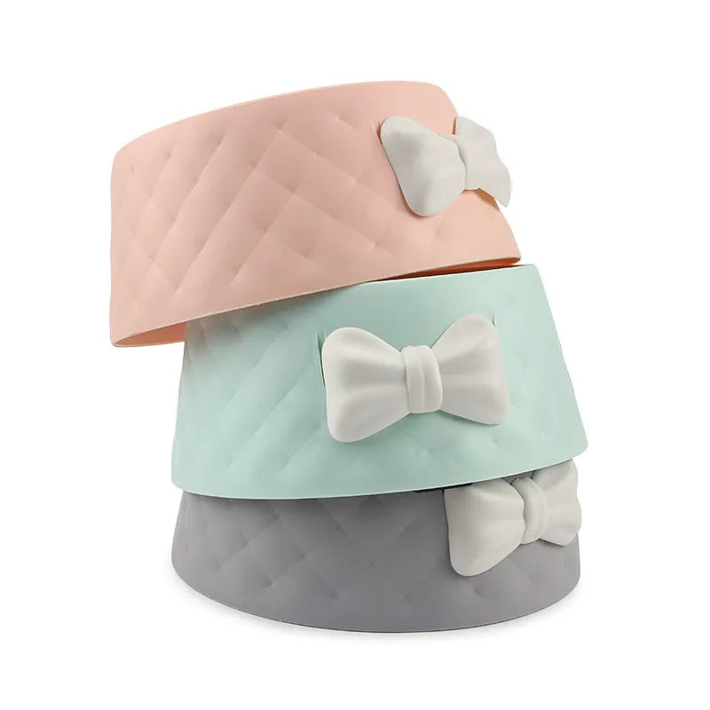 Bow cat bowl and dog bowl in PP plastic, shown in pink, green and grey colour options for pet feeding.