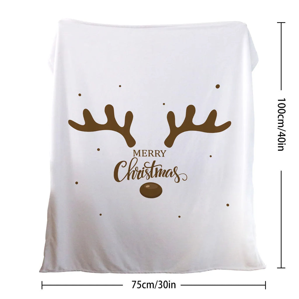 Deer antler pattern Christmas limited edition white flannel velvet blanket on a sofa