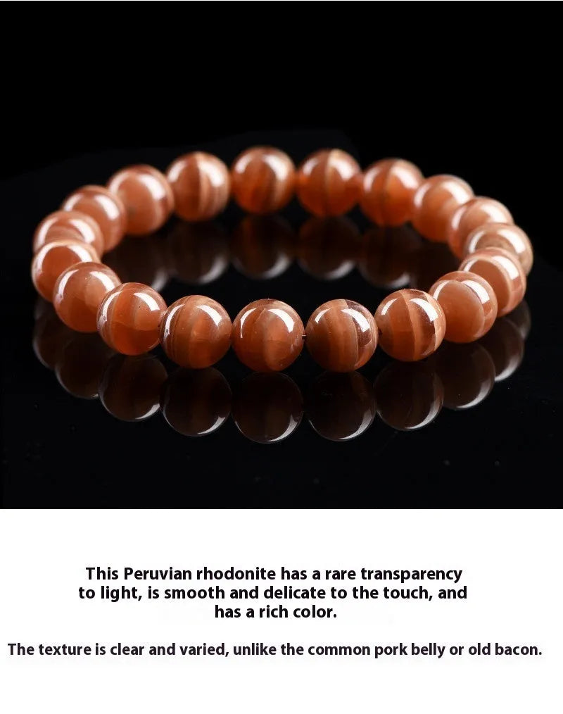 Natural Peruvian rhodochrosite bead bracelet in old mine colour, showing round 8mm beads.