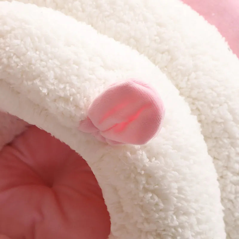 Blue enclosed cat nest bed with removable fleece liner, shown in a small size suitable for a kitten.