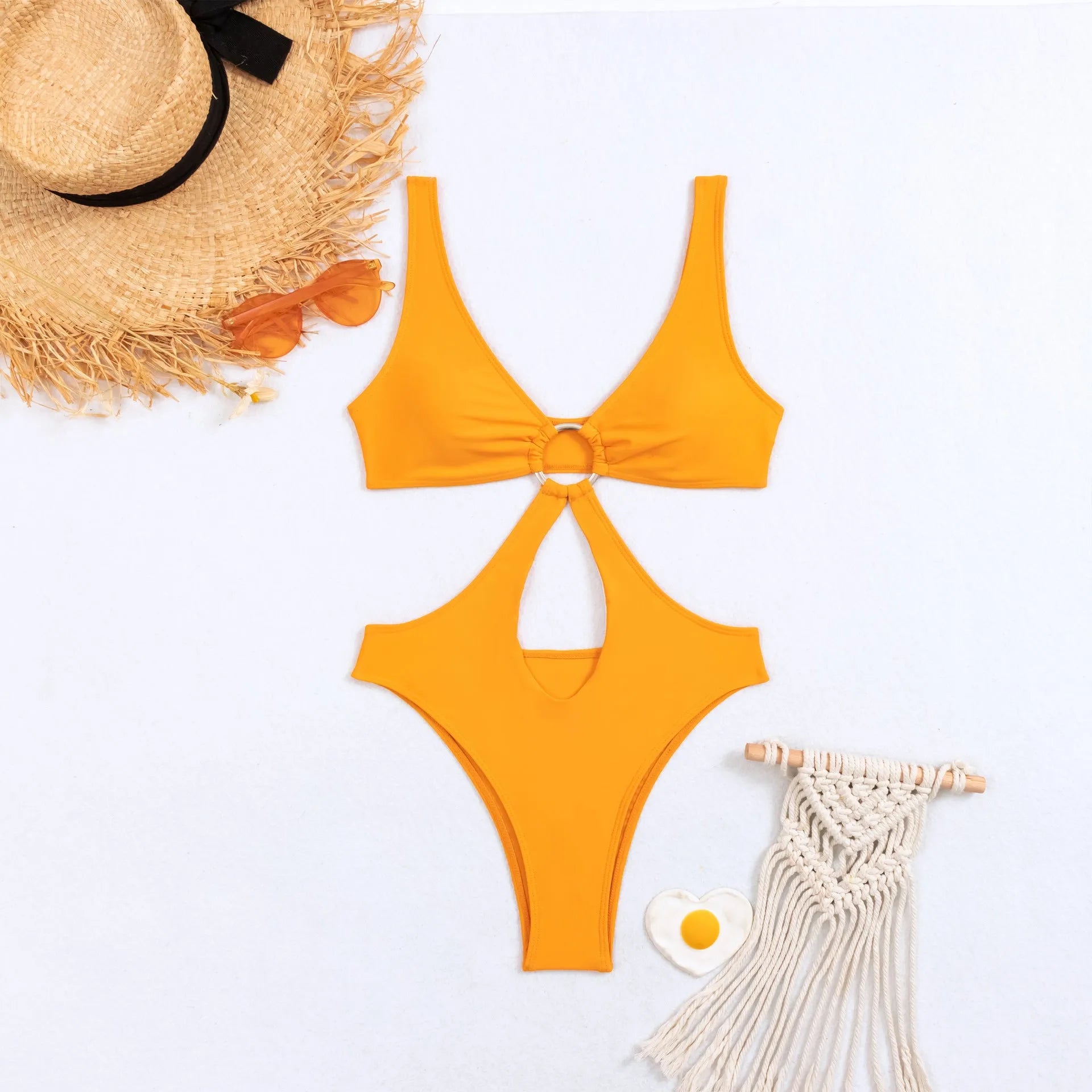 Women's triangle one-piece swimsuit in black, yellow and red colours with sleeveless nylon design