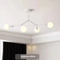 Simple Nordic style iron chandelier ceiling lamp in black or white with multiple light heads.