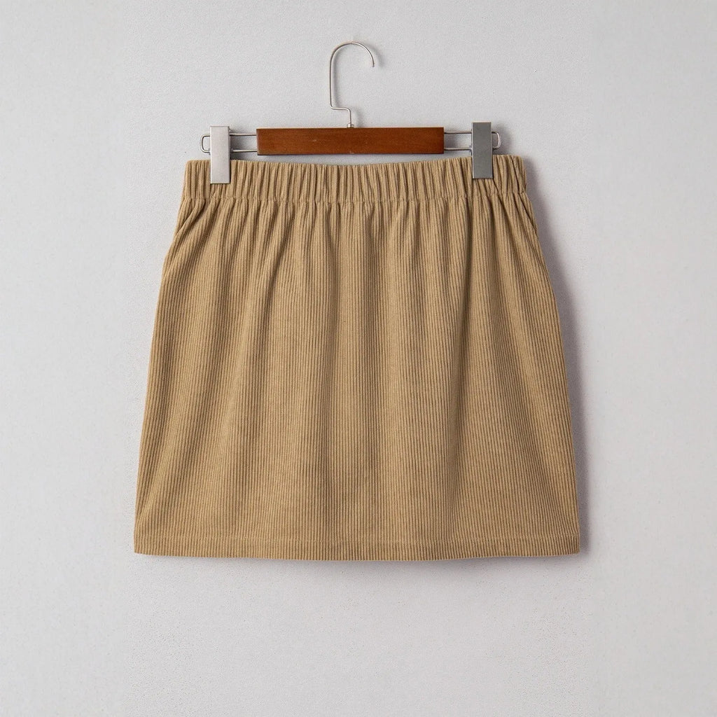 Women's corduroy hip skirt in solid coffee colour, short street-style design with button detail, sizes S to XL