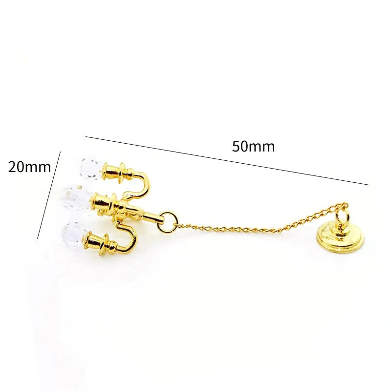Miniature metal retro photo prop decorations in gold and silver finishes measuring 5x2cm