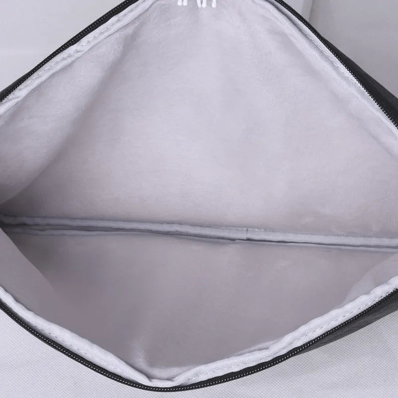 15-inch water repellent polyester laptop liner in light grey, slim design for laptop protection