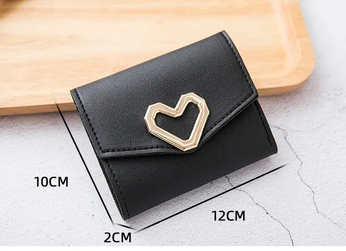 Women's PU leather tri-fold wallet with magnetic buckle, card slots, and coin pocket in black