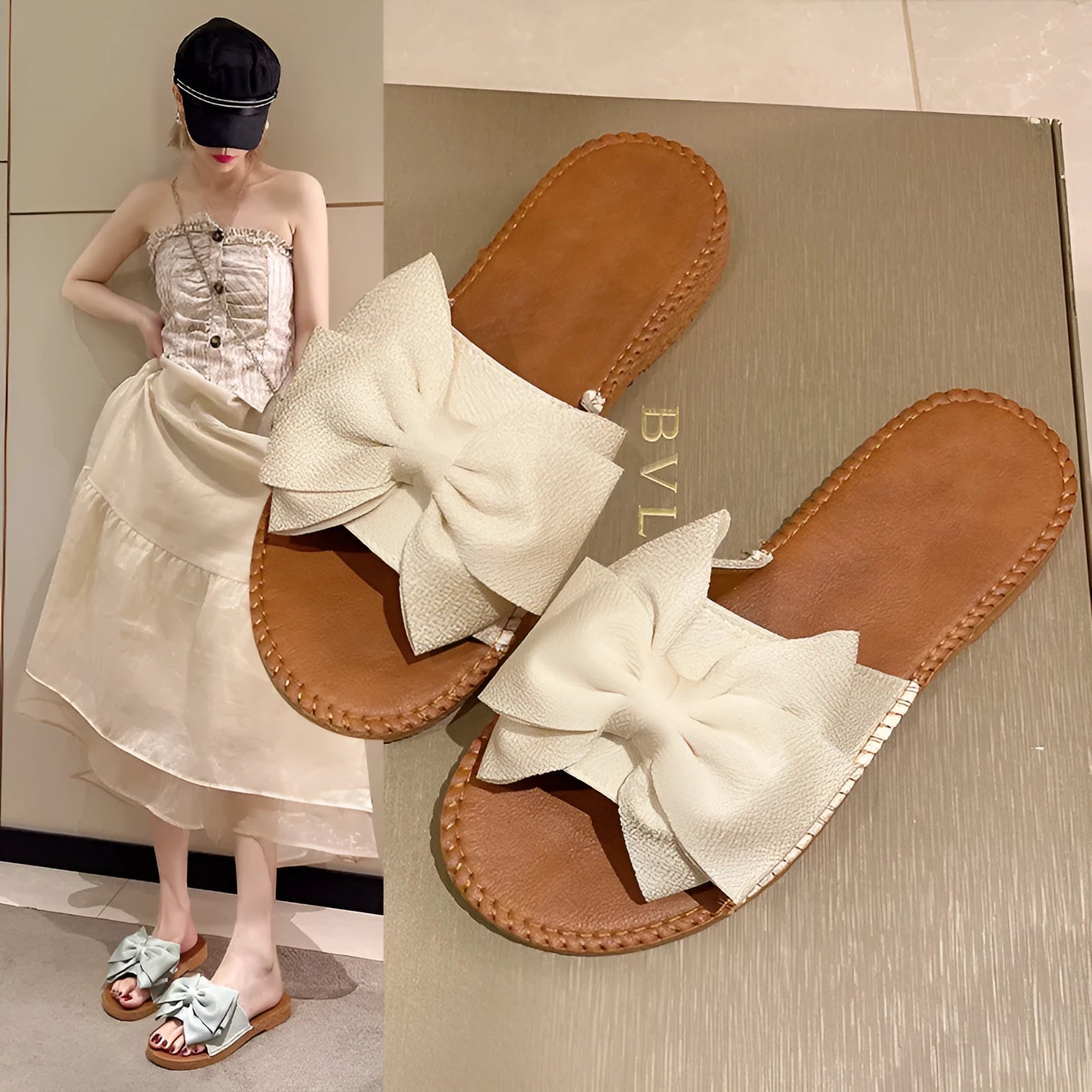 Women's beige suede slip-on sandals with a flat heel and soft bottom on a light background
