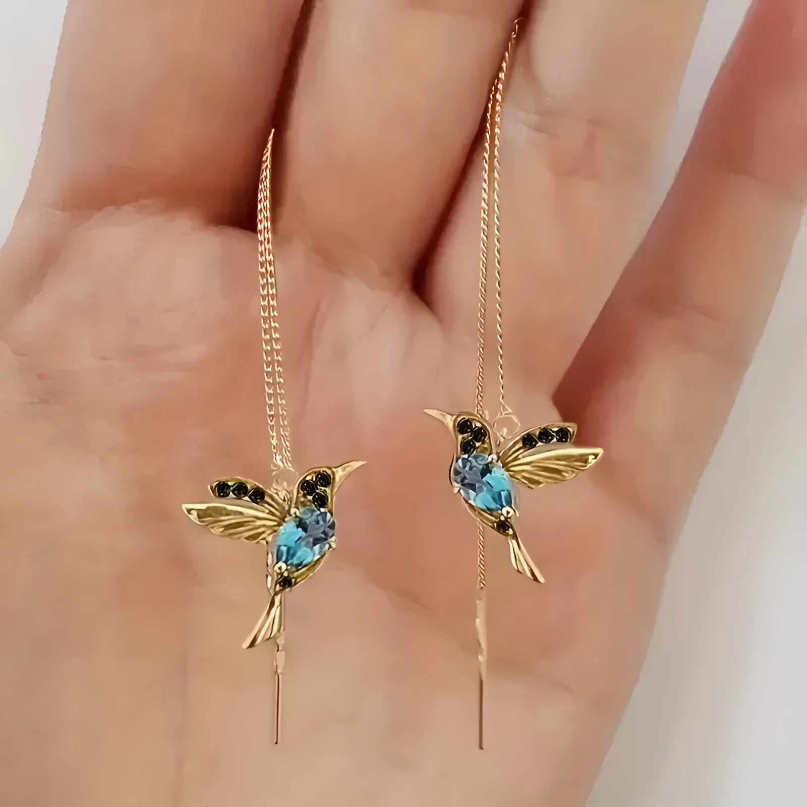Bird hanging long style earrings with mixed zirconium wing design in alloy construction