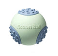 Green rolling ball dog toy for small medium breeds on a floor.