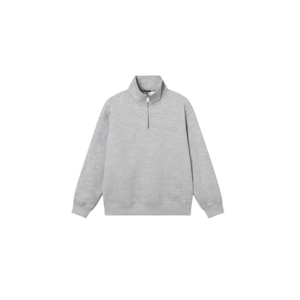 A grey half-zip stand collar cotton sweater laid flat, showing the front zip and long sleeves.