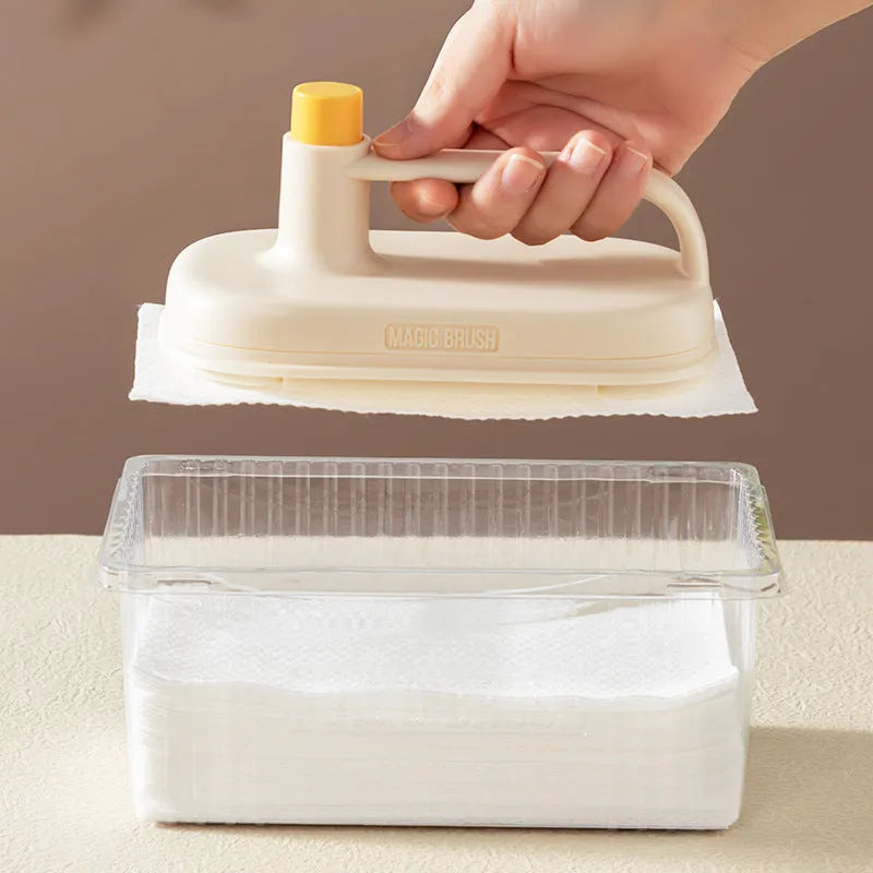 Magic Brush cleaning tool with plastic handle and stack of 50 white disposable non-woven fabric rags