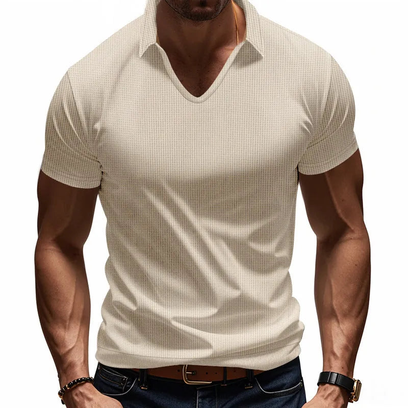 Men's loose-fitting light blue V-neck short-sleeved cotton blend t-shirt laid flat.