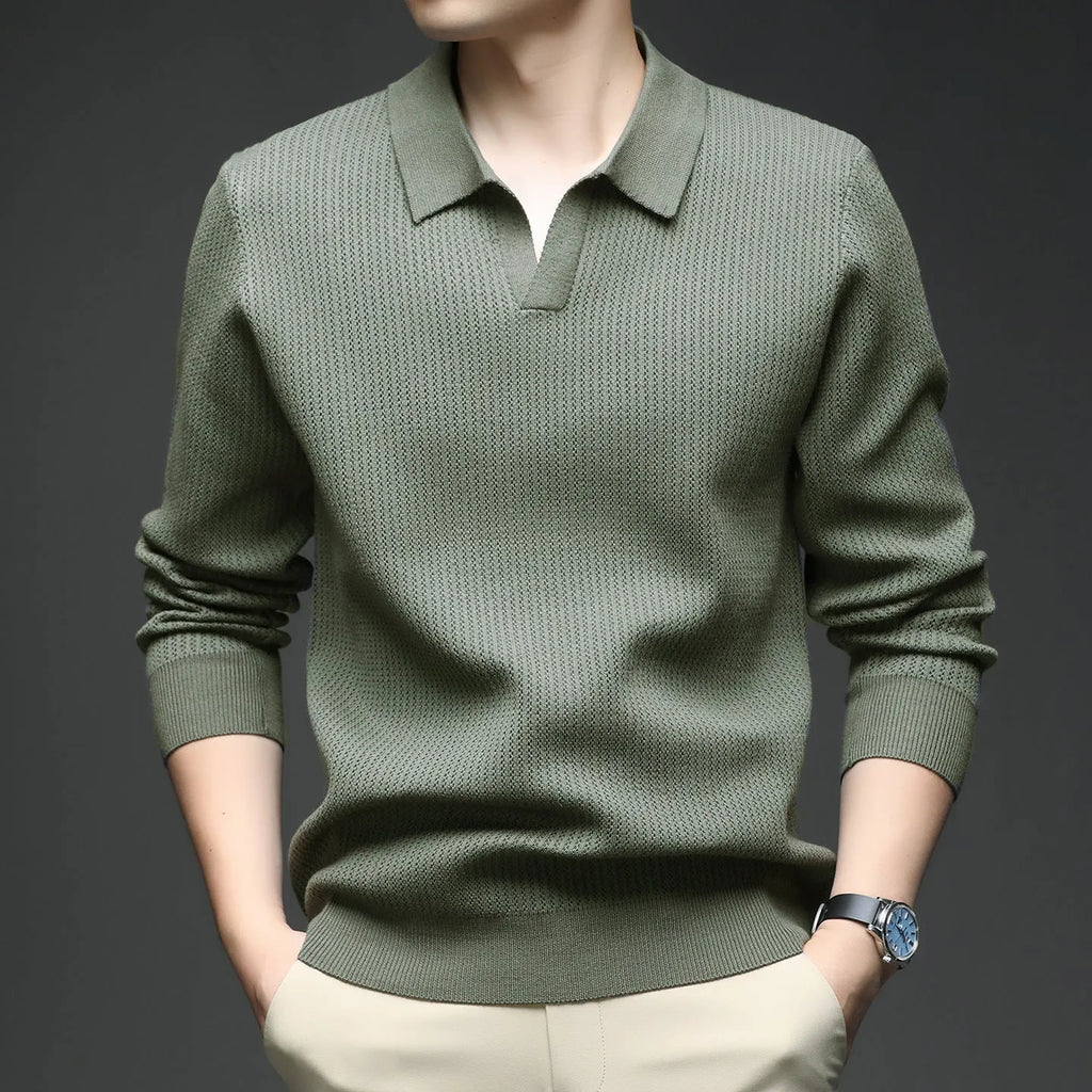 Men's loose-fitting casual pullover sweater in a polyester viscose nylon blend, shown in green.