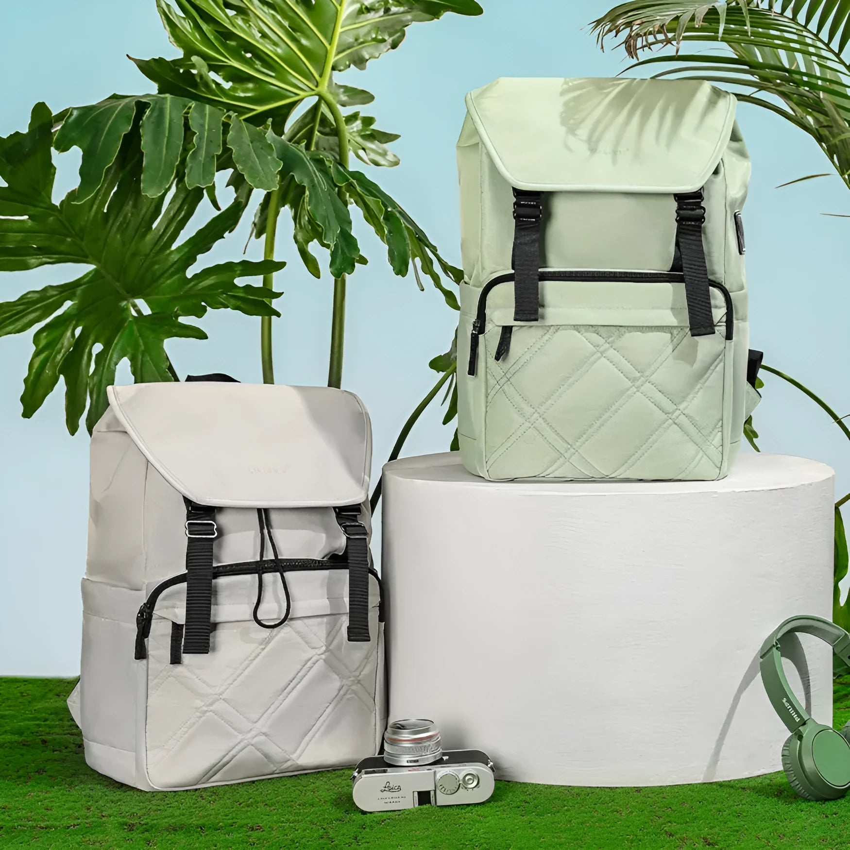 Light green schoolgirl travel backpack showing laptop compartment and organisational pockets