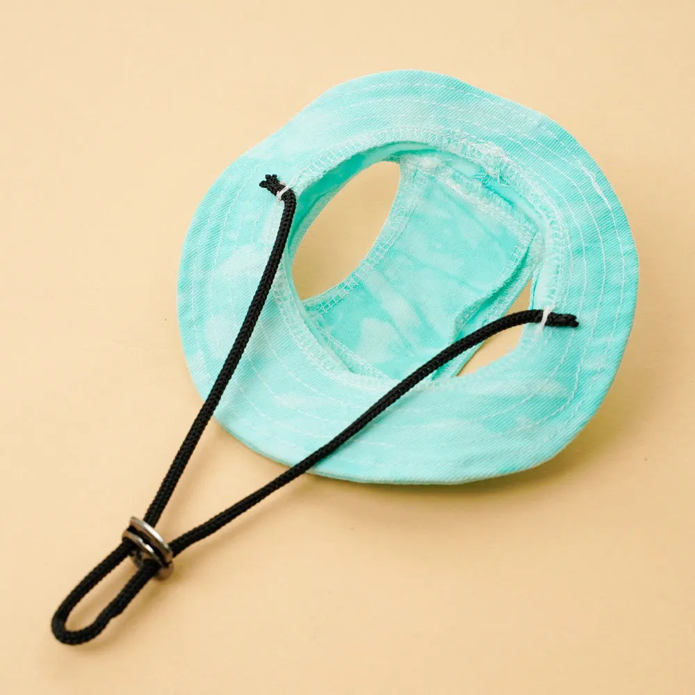 Tie dye polyester sun protection bucket hat with adjustable string clip for pets, shown in colour option