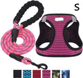 Reflective nylon dog leash with traction belt and chest strap in black and pink, sizes S to XL.