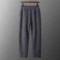 Men's thick cashmere high waist tapered trousers in Black, Elephant Grey, and Raw Velvet, full length, sizes M to XXL.