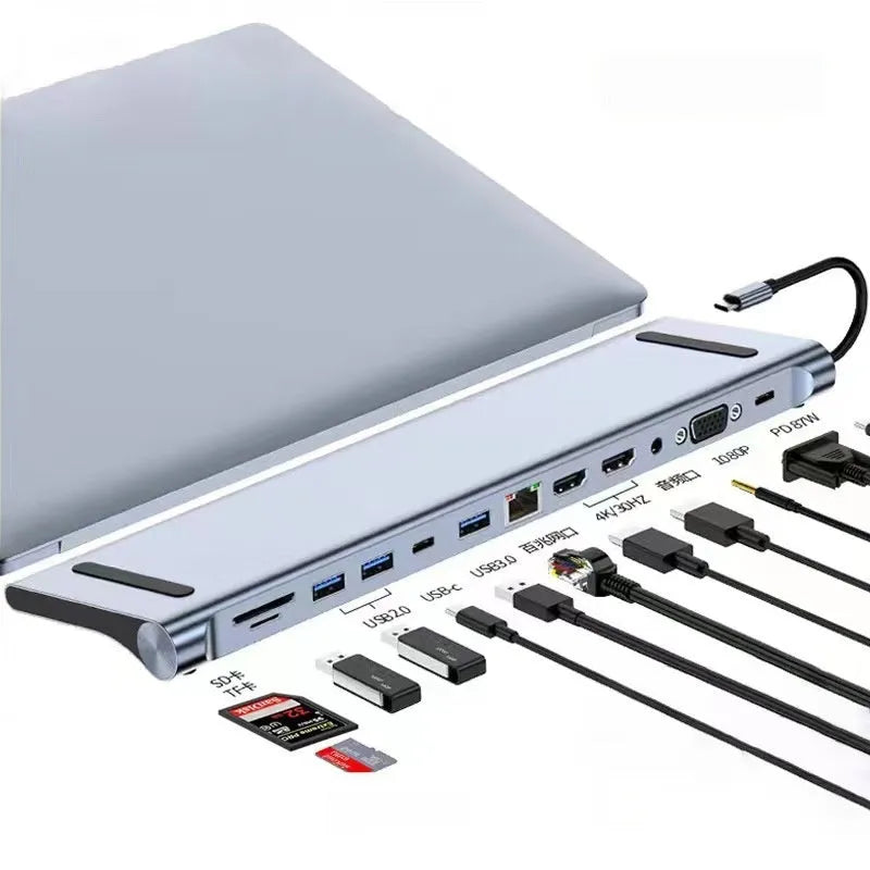 Silver 7-in-1 USB-C expansion dock with HDMI, VGA, USB ports, and a short 15cm connecting cable.