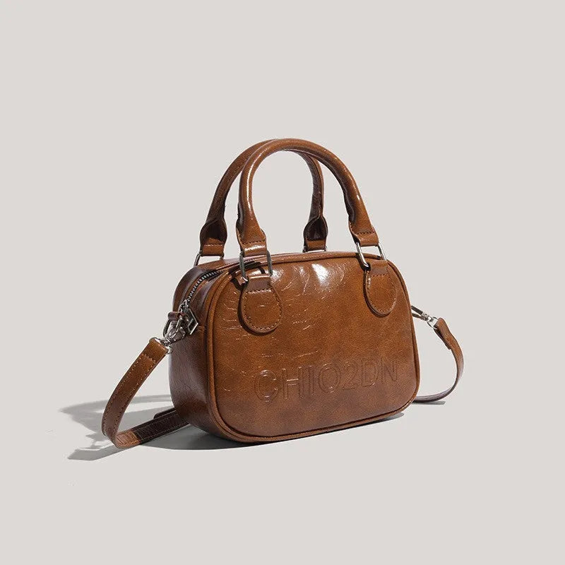 Retro easy matching shoulder crossbody bag in black or brown with letter and stitching design