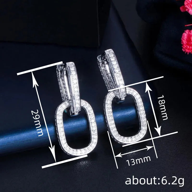 U-shaped geometric copper earrings for women with inlaid zircon, shown in white gold colour and yellow gold colour options.