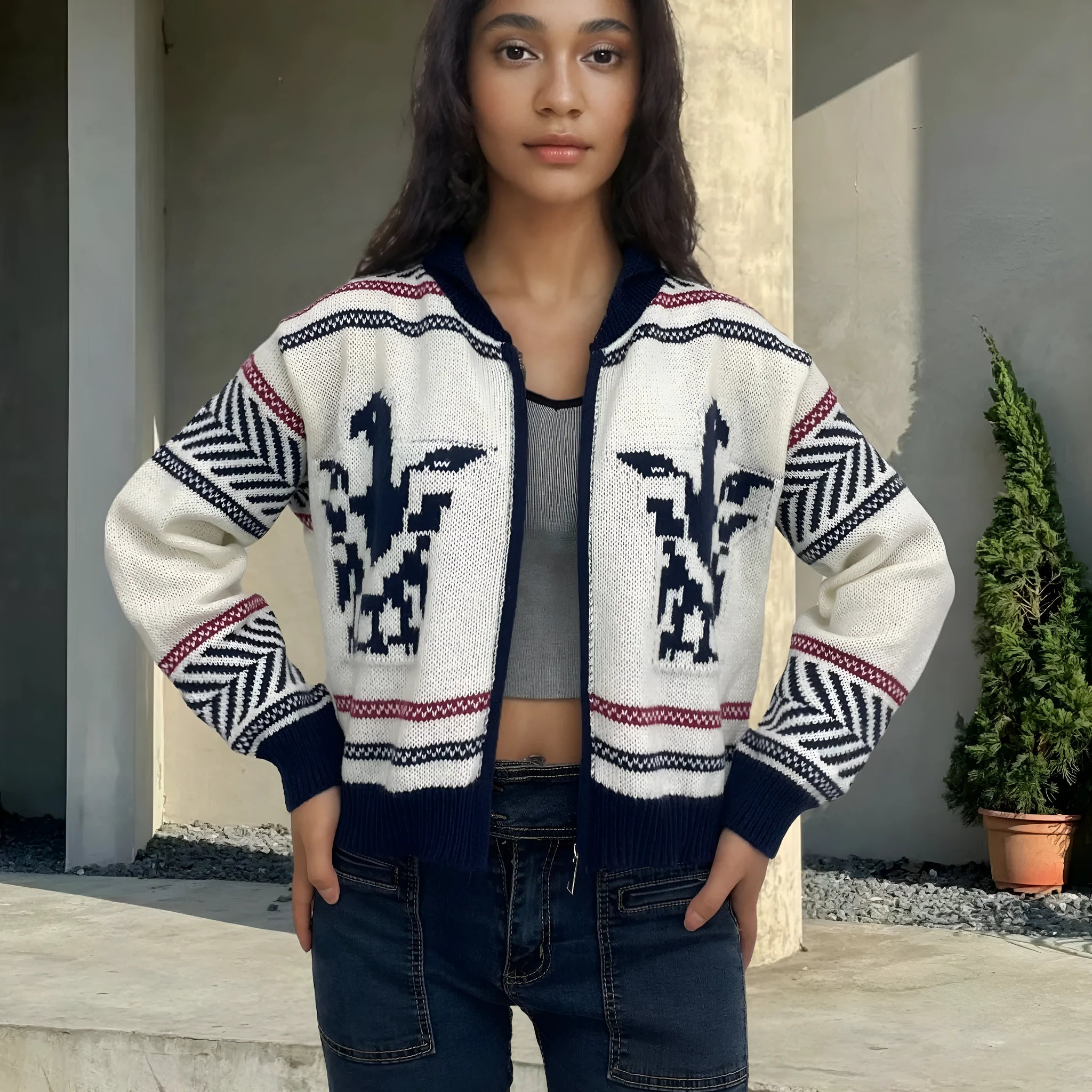 White women's wool Jacquard cardigan with a contrast colour stripe pattern on the front.