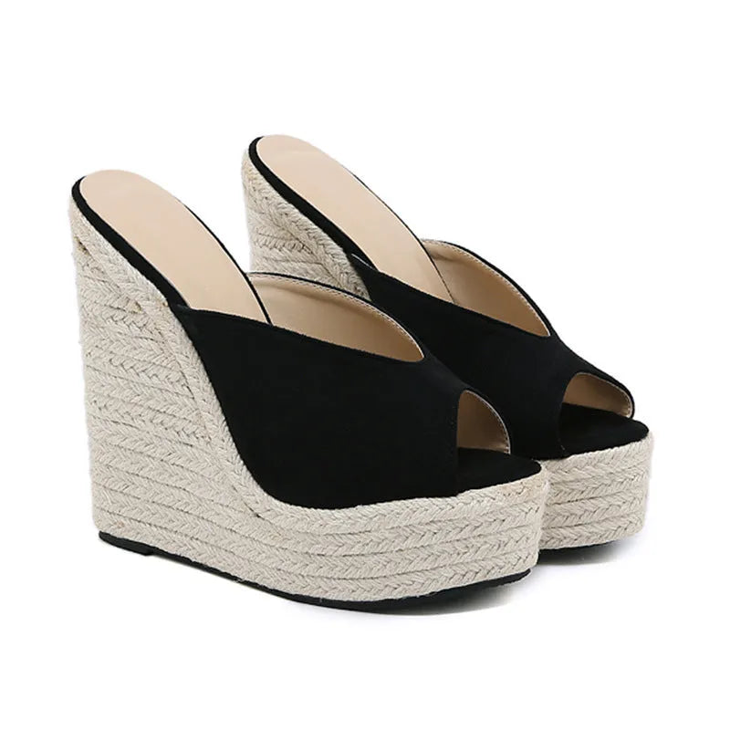 Women's black suede open toe high heel sandals with rubber sole, side view