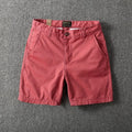 Men's cotton loose shorts in straight-leg design with zipper fly, shown in multiple colour options