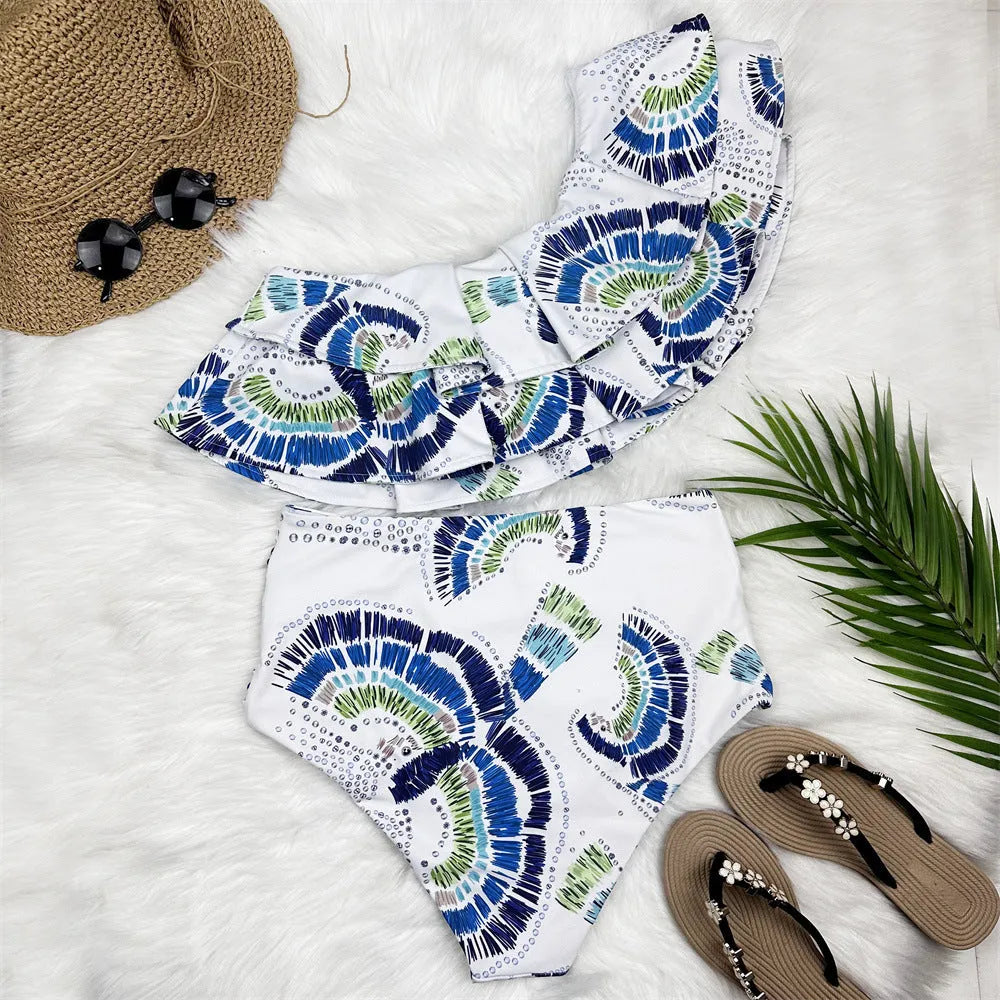 White women's one-shoulder swimsuit with a double-layer lotus leaf split design.