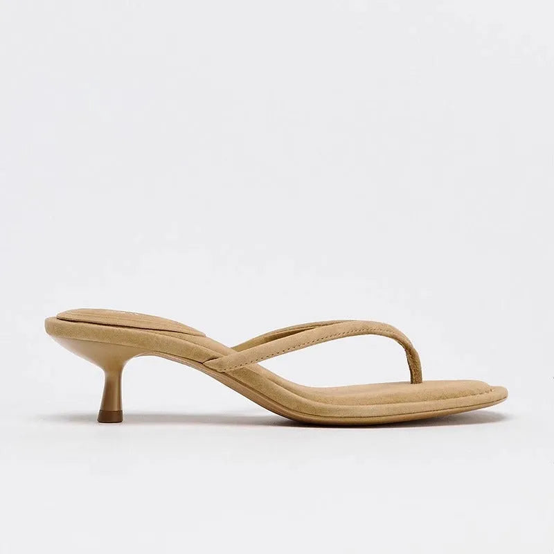 Women's khaki round toe flip-flop sandals with a mid heel on a plain background.