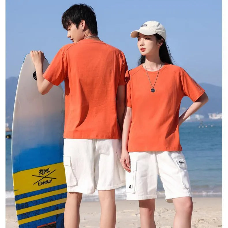 Men's straight cut short sleeve pure cotton T-shirt on a hanger in a solid colour.