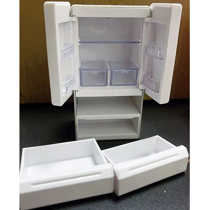 White plastic miniature candy shop model with internal light turned on, showing detailed interior.