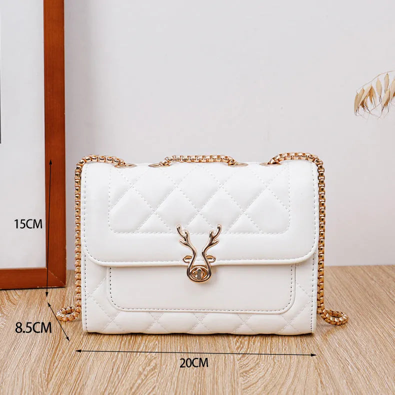 Summer Sheep Diamond Pattern PU Shoulder Bag, black and white, with chain strap and outer pocket.