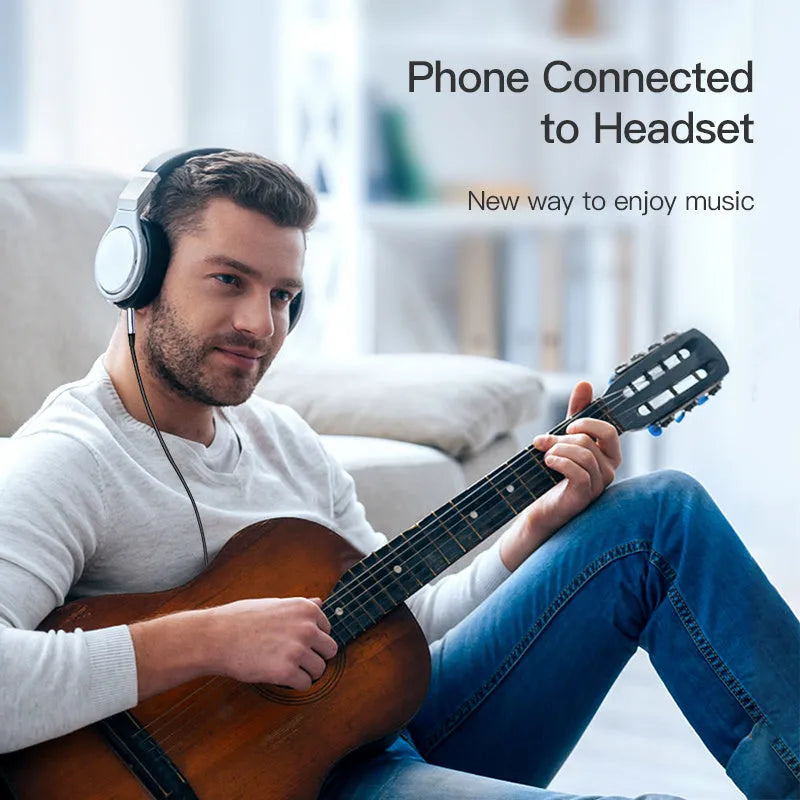 Braided nylon headphone adapter cable in silver and black colour options showing 3.5mm jack connectors.