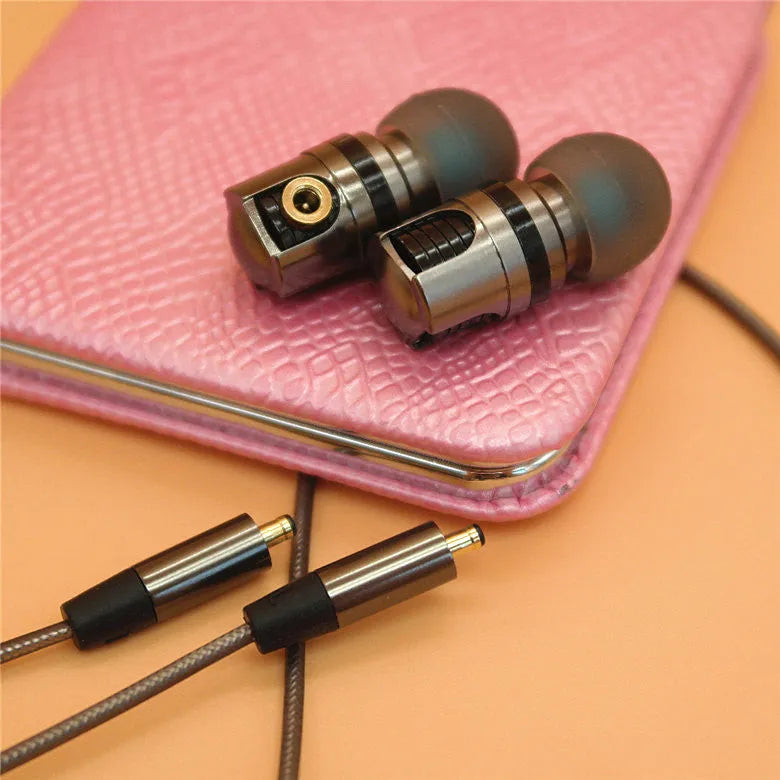 Titanium grey metal in-ear earphones with a braided aluminium foil and TPE cable and detachable connectors.