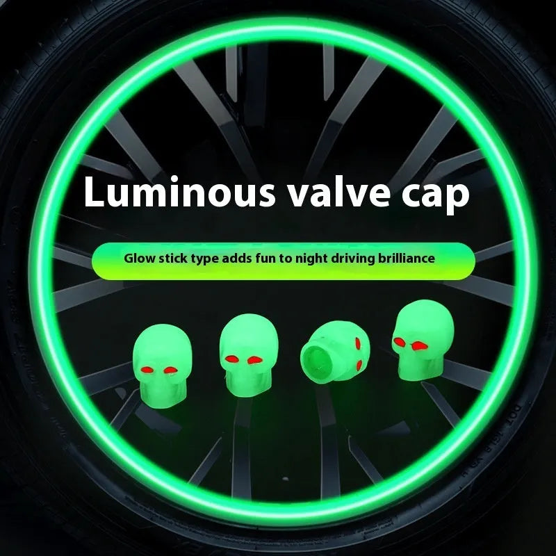Luminous skull-shaped rubber car tyre valve cap in glow effect on a standard wheel