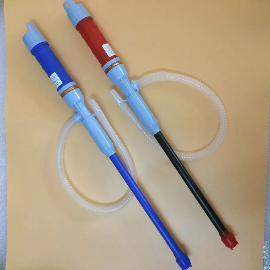 Blue and red manual plastic fuel transfer hand pump with tubing