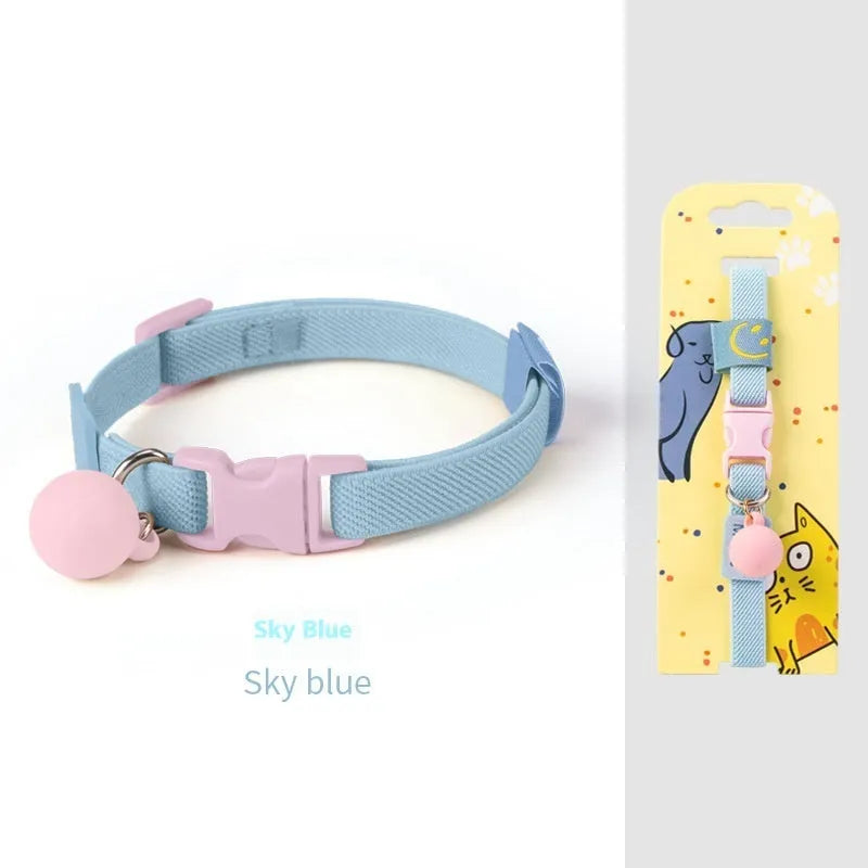A stretchy, solid-colour polyester dog collar for small breeds, shown in sky blue, adjustable from 22 to 32 centimetres.
