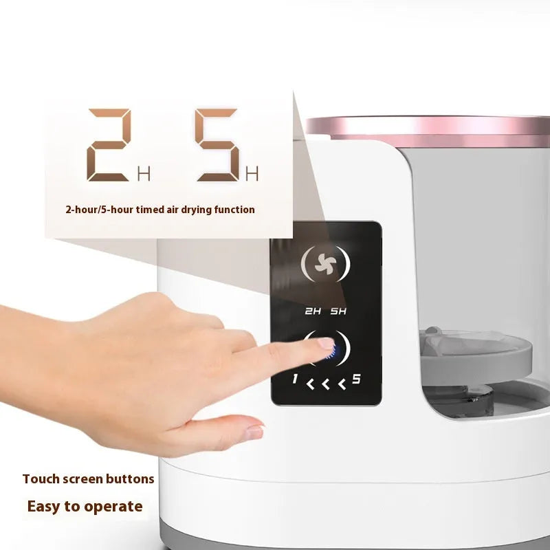 Electric makeup brush cleaning device with drying chamber showing brush placement and compact design