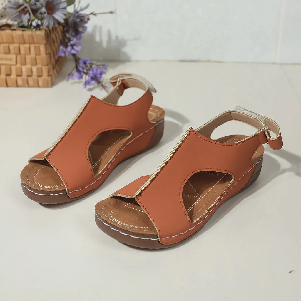 Women's plus size wedge sandals in light brown with Velcro strap, PU upper, and round toe on a neutral background