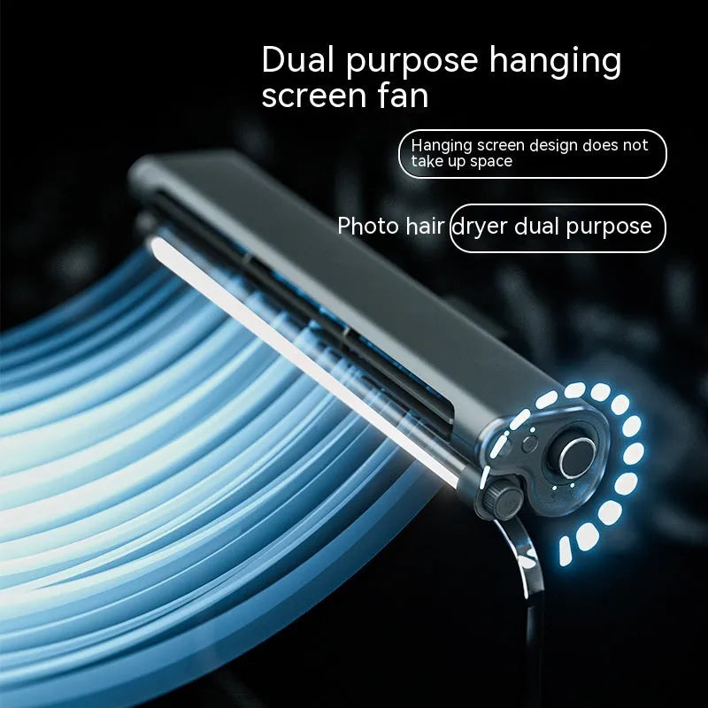 Black USB-powered bladeless fan with clip and integrated desk lamp attached to a laptop screen.