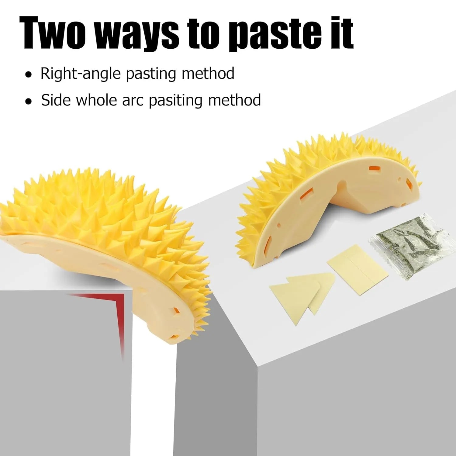 Yellow durian-shaped cat corner scratcher with comb teeth and cat mint packet mounted on wall