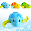Plastic baby tortoise bath toy floating in water for infant bath time play