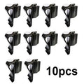 Black ABS plastic golf club clamp holding a golf club shaft