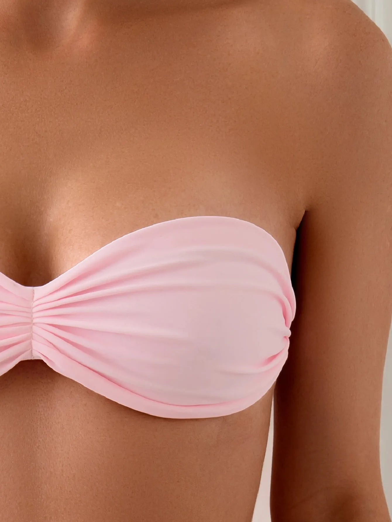 Women's pink bikini set with lace-up tube top and matching pants