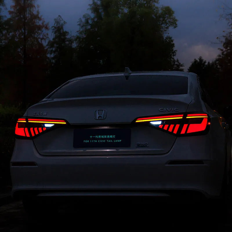 11th generation Honda Civic black and red LED tail light assembly with sequential turn signals