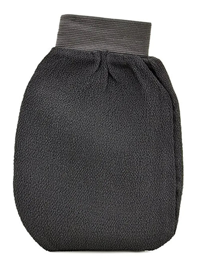 Exfoliating kessa scrub glove made from loofah material, single mitt for shower body exfoliation and self tan preparation