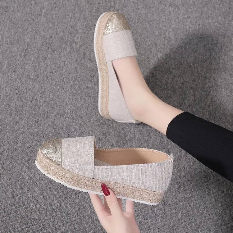 Plus size breathable canvas flat shoes in black and beige with round toe and slip-on design.