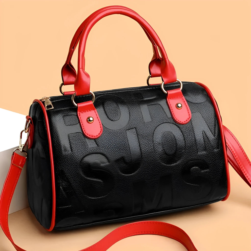 Brown cylindrical crossbody bag with three adjustable shoulder straps showing leather-like PU material texture
