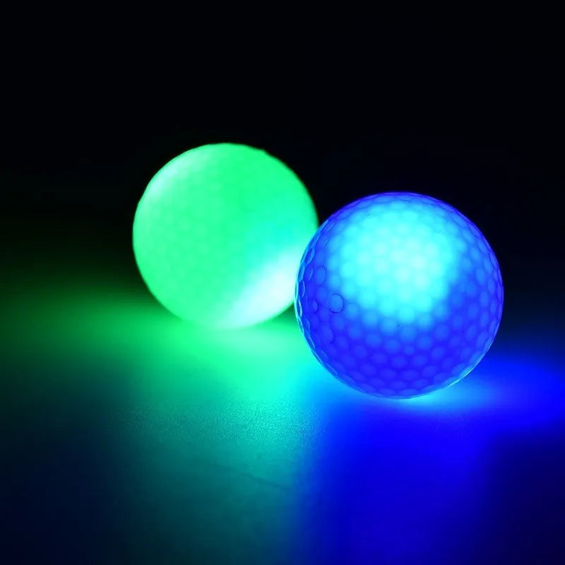 Glow Ball strobe golf ball on grass, random colour, 4.3 cm diameter