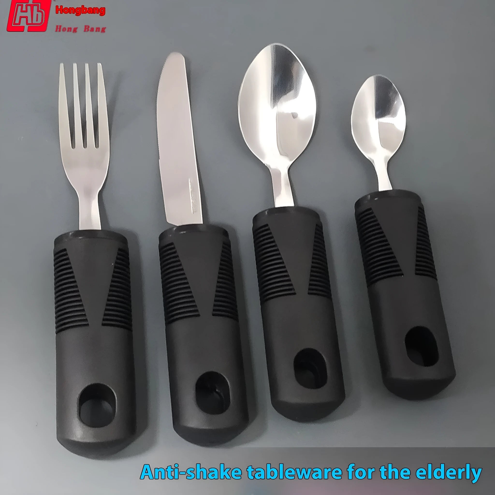 Stainless steel anti-shake cutlery with black rubberised handles, shown in a curved three-piece set.